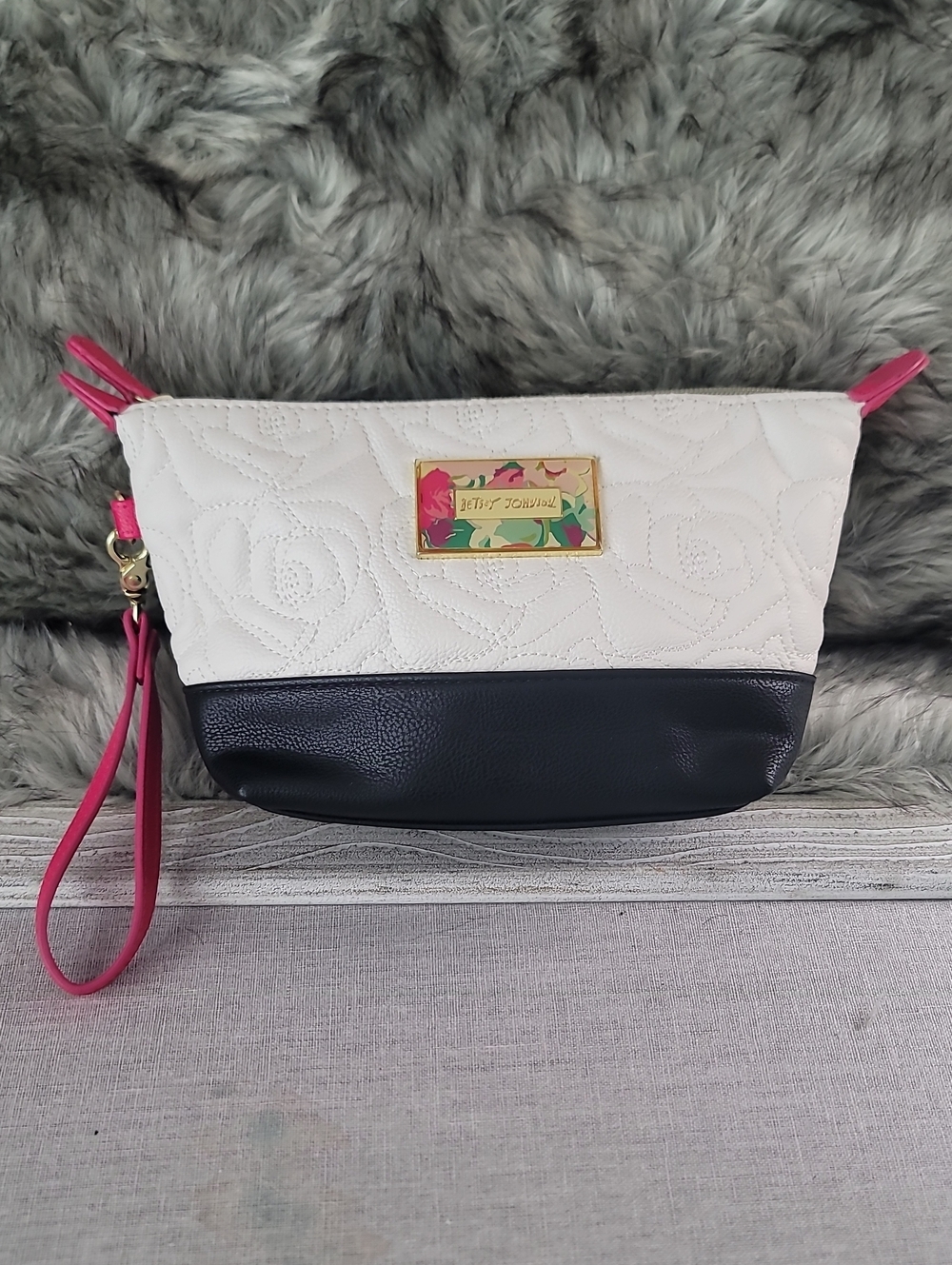 White Quilted Wristlet Clutch with Black Base and Pink Accents